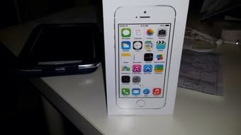Unlocked Unopened iPhone 5s 16g silver for $490 1