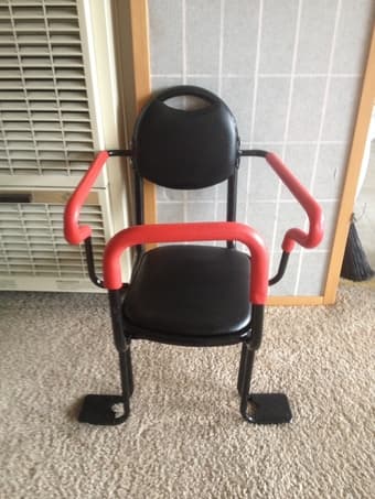 a new bicycle child seat and a female helmet 1