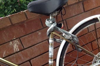 Golden Vintage bike, woman 1