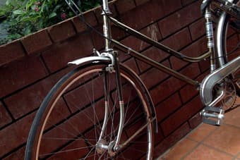 golden vintage bike, woman 2
