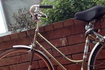 golden vintage bike, woman 3