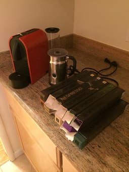 FOR SALE: Nespresso coffee machine, a milk foamer and assorted capsules 3