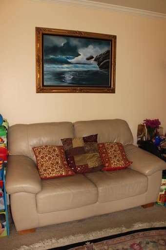 leather sofa and love seat to sell ($200) 1