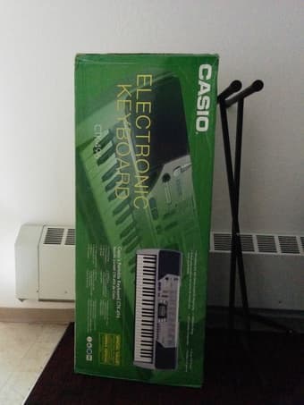 Casio Keyboard (CTK-496) with stand - $85 1