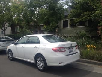 2012  White Toyota Corolla LE Sedan 4D ( 33K milage, $15000) 2
