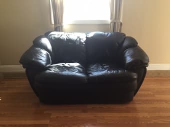 Black leather couch (2 seater) $200 1