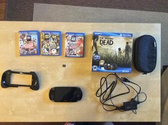 Playstation Vita with many accessories and 3 games - $200 1