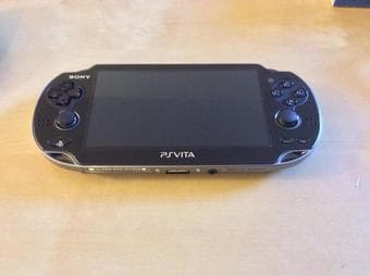 Playstation Vita with many accessories and 3 games - $200 2