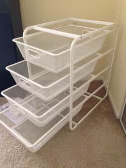 Selling container with 4 baskets for $15. 1