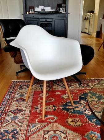Eames style molded plastic armchairs 1