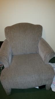 Big comfy chair, TV, suitcase, dishes, wine glasses, etc. 1