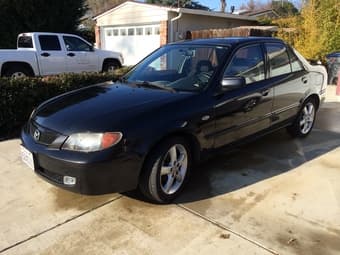 2003 Black Mazda Protege ES 5-Speed MANUAL, 77,352 miles, $3,300 1