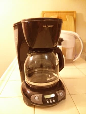 MR.COFFE coffee maker and wine glasses and decanter set at Studio 6. 1