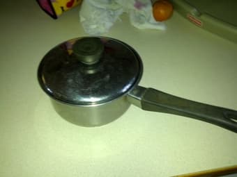 Stainless steel pot with lid $2 1