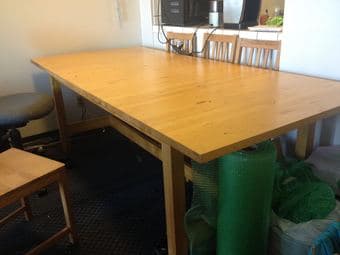 Light wood colored table, seats 8-10 -- $100 1