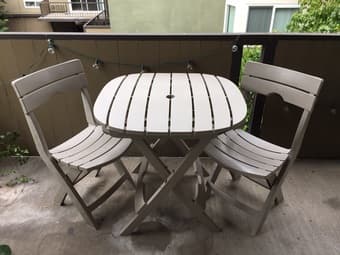 Outdoor foldable plastic table + 2 chairs $70 OBO 1