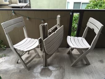 Outdoor foldable plastic table + 2 chairs $70 OBO 2