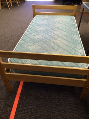 Twin size bed (wood frame) with mattress($120) 1