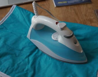 Iron and ironing pad for $7 1