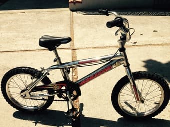 $45 for18" mongoose bicycle for 5-8 years old boy with a90%new helmet 2