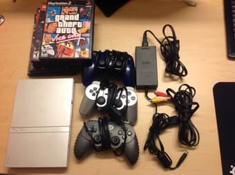 PS2 slim, 3 controllers, 6 games, $90 1