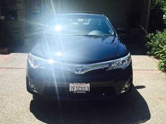 Toyota Camry Hybrid XLE 2014 under warranty in perfect condition 1