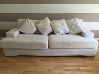Light Cream colored Ikea Couch + 4 cushions available for $100 2
