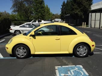 Yellow VW Beetle, year 2000, 171254 mi - $1343 2