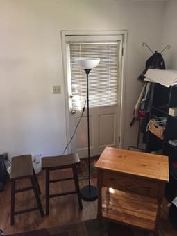 Table with drawer, two stools, and two floor lamps 1