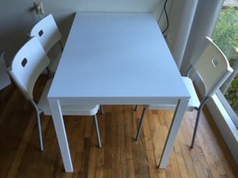 IKEA White dining table with three chairs for $150 1