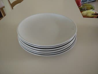 6 Ikea beige plates ($8 total) 1