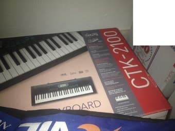 Casio CTK-2100 Keyboard with the holder 50$ 1