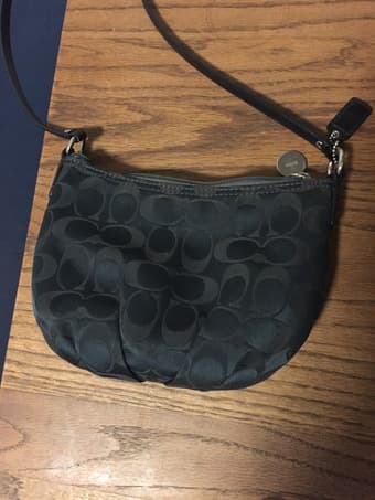 Coach black cross-body bag 1