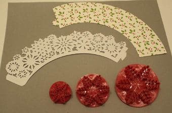 Snow flakes cutter with 12 Christmas cupcake wrappers - $5 1