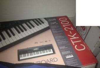 Casio CTK-2100 Keyboard with the holder 50$ 1