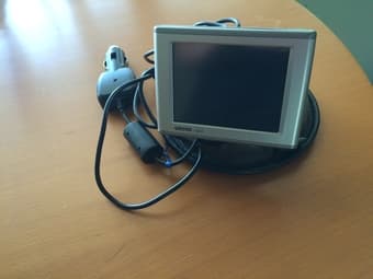 TomTom GPS with stand $40 obo 1