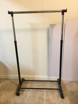 Clothes rack on wheels $20 obo 1