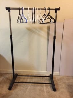 Clothes rack on wheels $20 obo 2