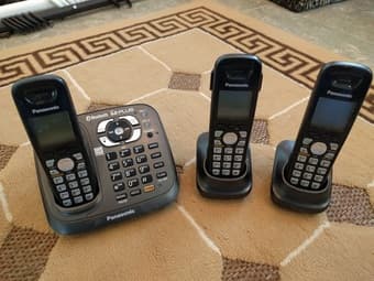 * Cordless phone with three remote phones and bluetooth - $15 1