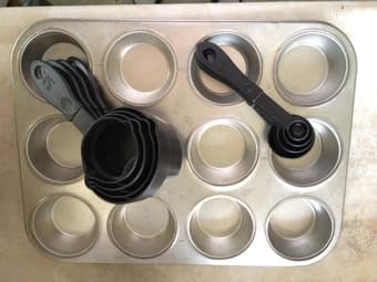 12-Cup Cupcake Pan and Measuring Cup Set $ 8 1