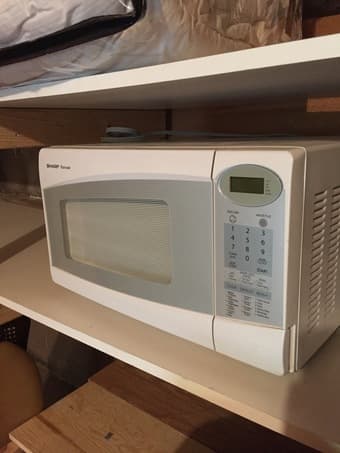 sharp carousel 1100watt microwave - $50 1