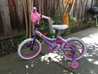For sale: Princess Bycicle for 3-6 yrs girl+helmet($25),football($8) 1