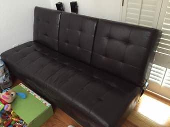 Black leather futon - $100. 1