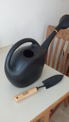 Watering can and small shovel together $7 1