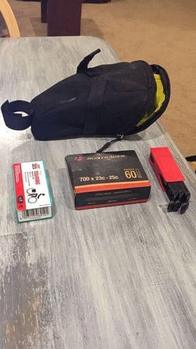 Helmet / Pump / Saddle bag with tools and new tube 2