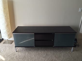 Sleek TV stand with plenty of storage space - $90 (on campus) 1