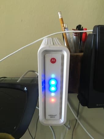 Motorola SURFboard SB6141 Cable Modem + Cisco Linksys router ($50 OBO) 1