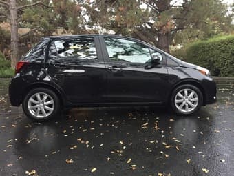 For sale - black 2015 Toyota Yaris LE in great condition $11500 3
