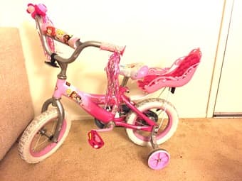 Moving out sale: 12" Disney Princes girl bike with doll carrier 1