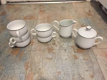 White and silver tea set by Lance $10 1